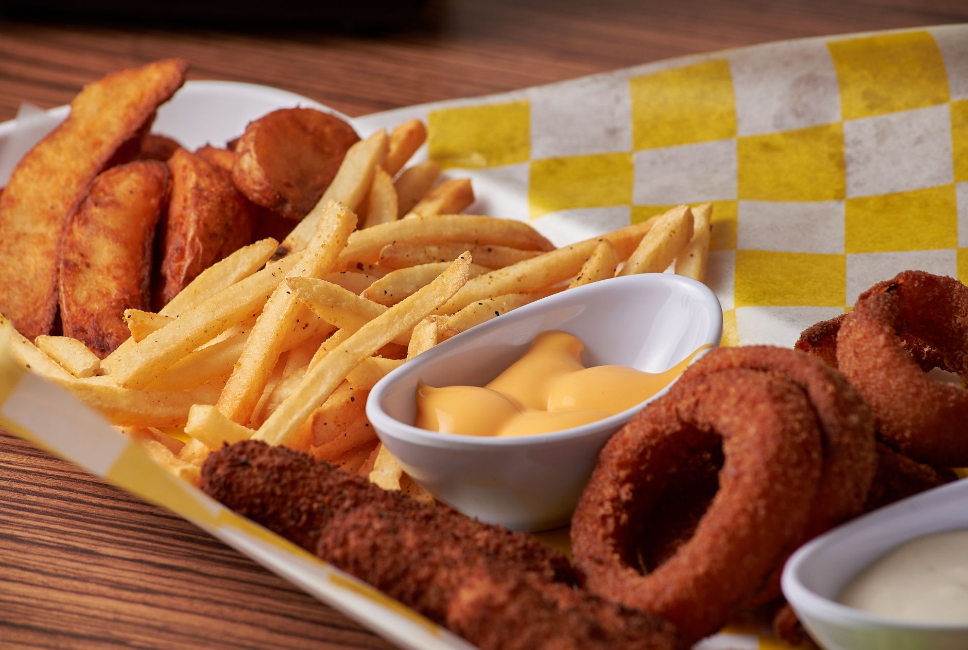 A close-up view of a basket filled with fried appetizers