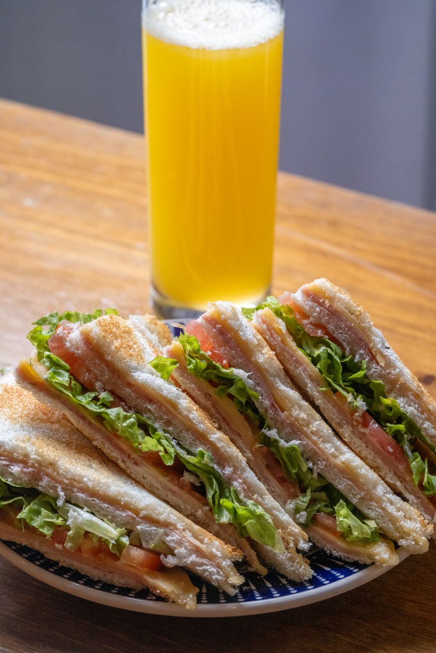 Close-up of a BLT sandwich with lettuce, tomato, and bacon