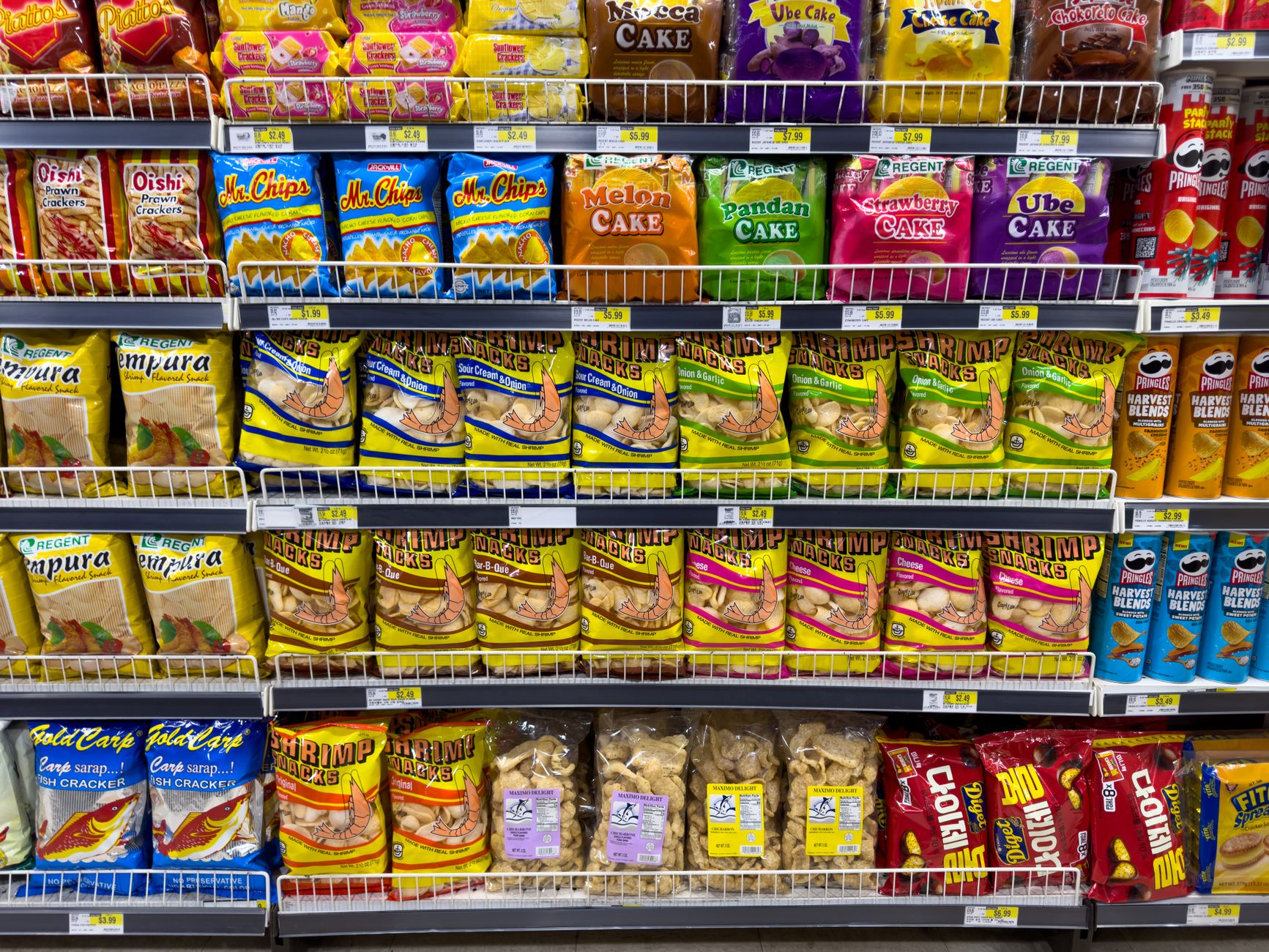 Colorful snack packages neatly displayed in a store aisle