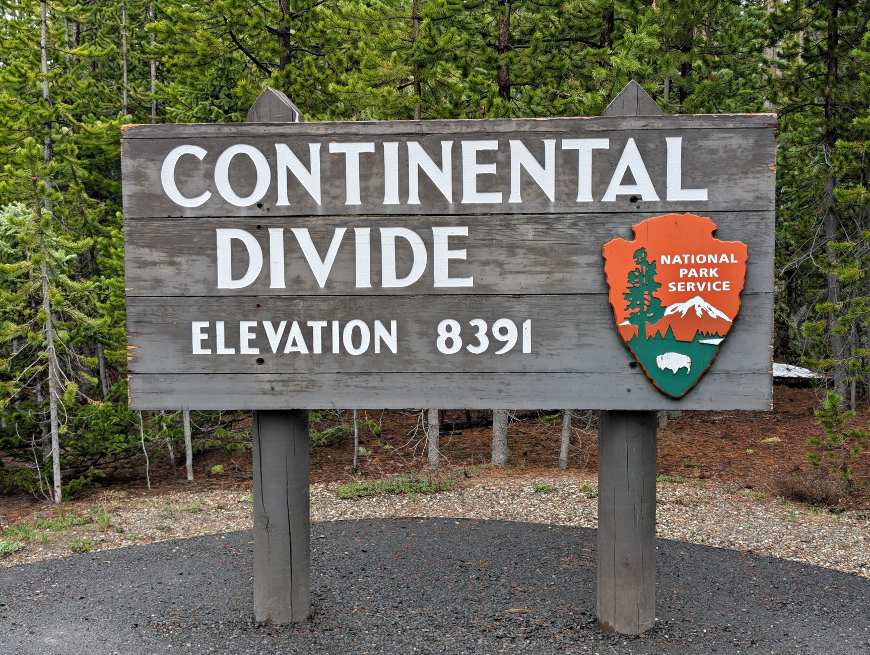 Continental Divide elevation sign along a Rocky Mountain highway