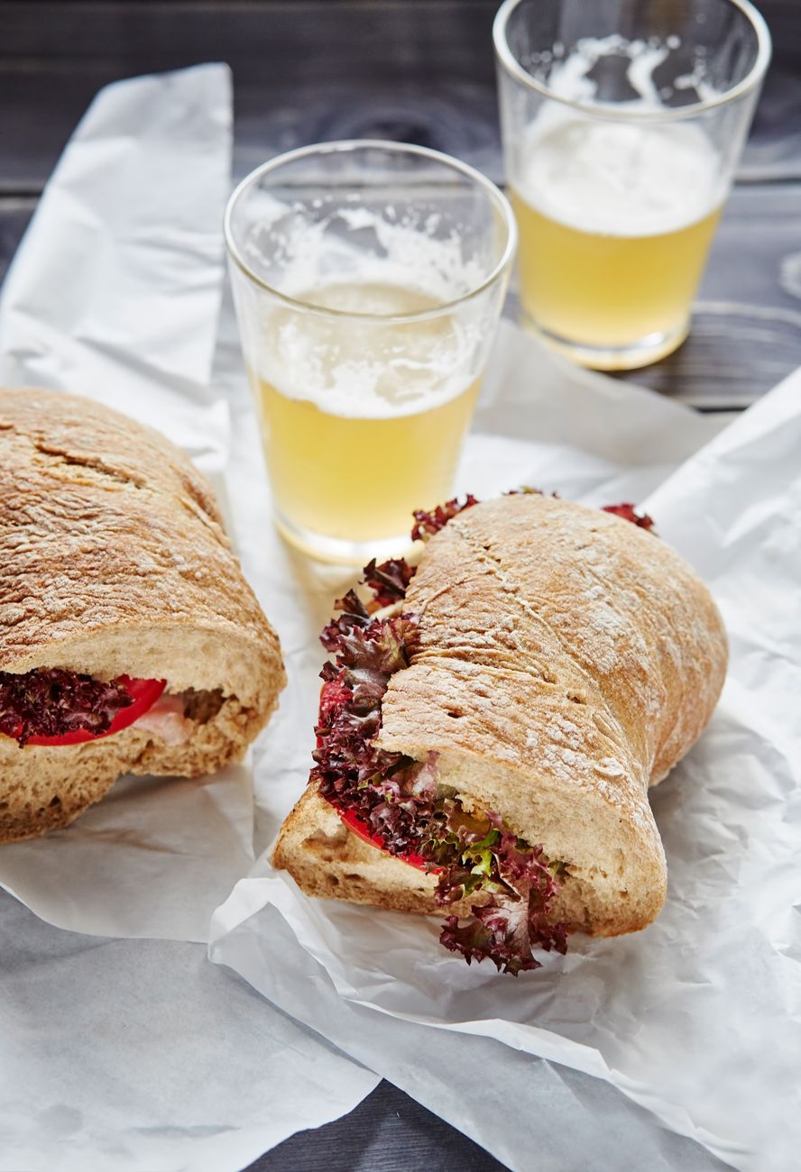 Close-up of a fresh sandwich on a rustic table