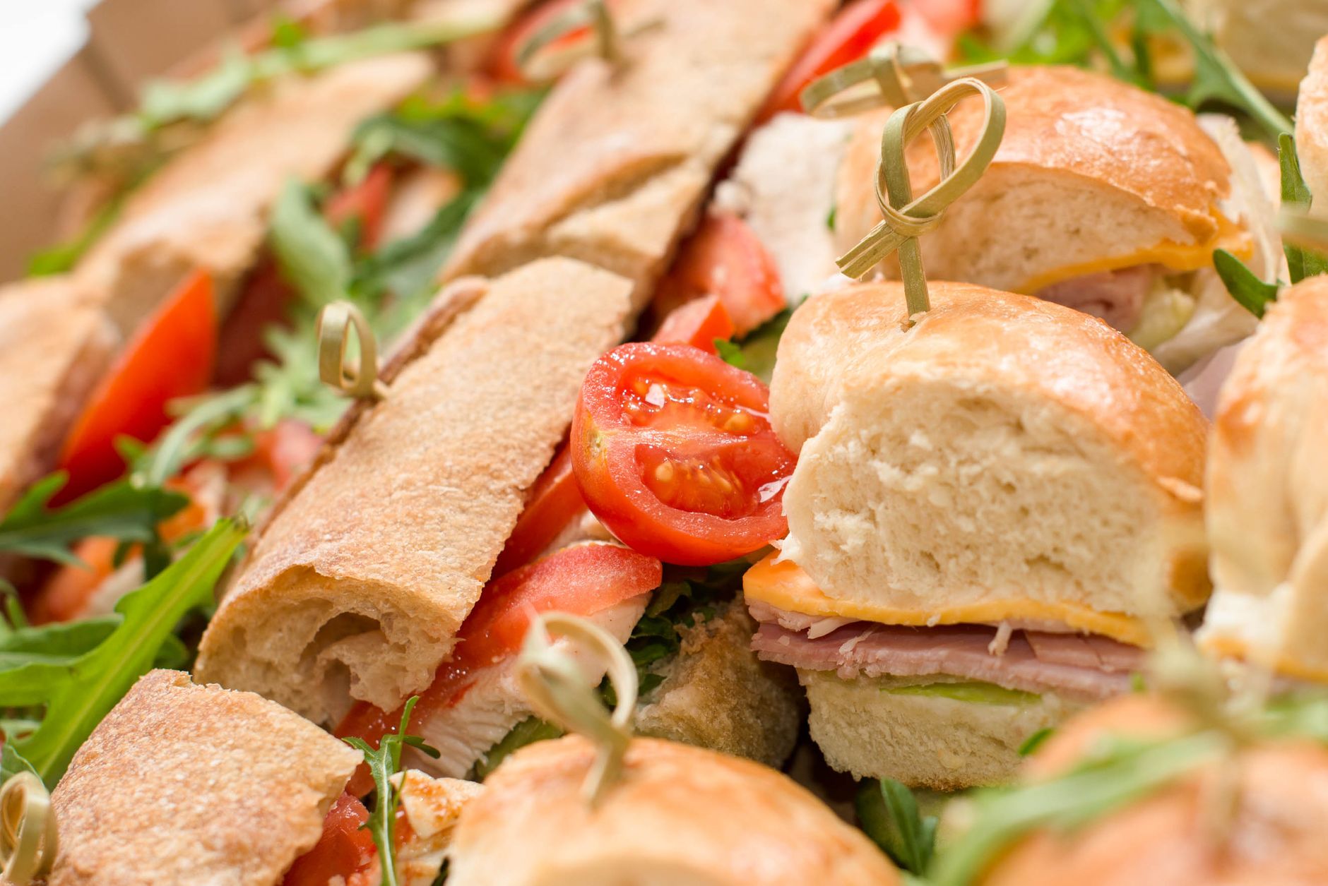 A delicious fresh sandwich variety with vegetables on a plate