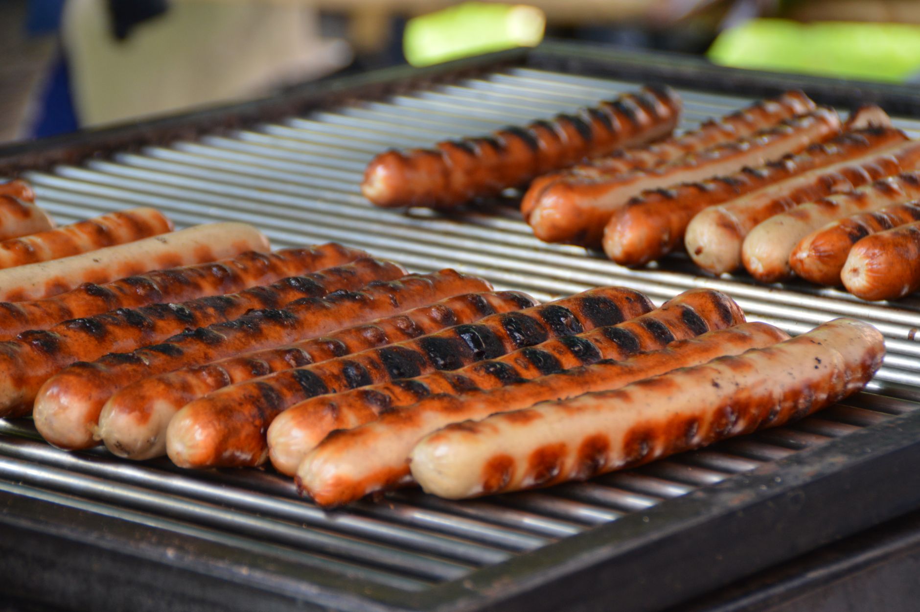 Deliciously grilled sausages on a barbecue, perfect for summer cookouts
