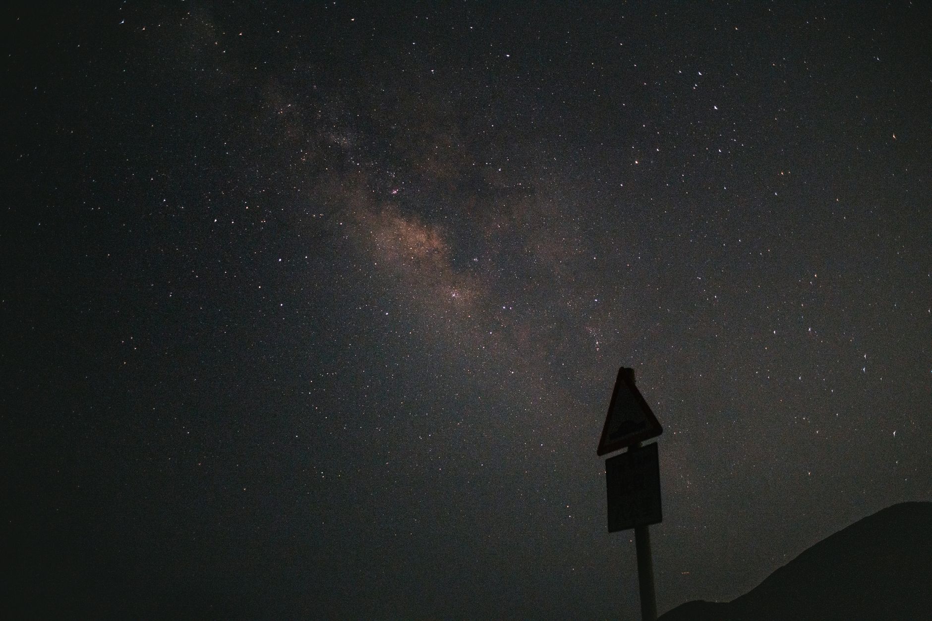 A mesmerizing view of the Milky Way galaxy under a dark, starry sky