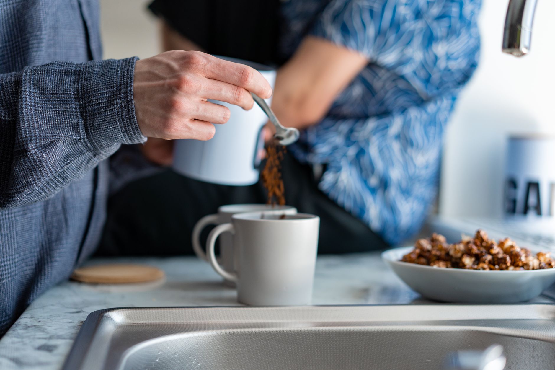 A serene morning scene of coffee preparation in a home kitchen