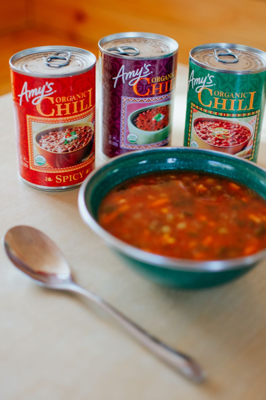 A vertical shot of organic chili served in a ceramic bowl