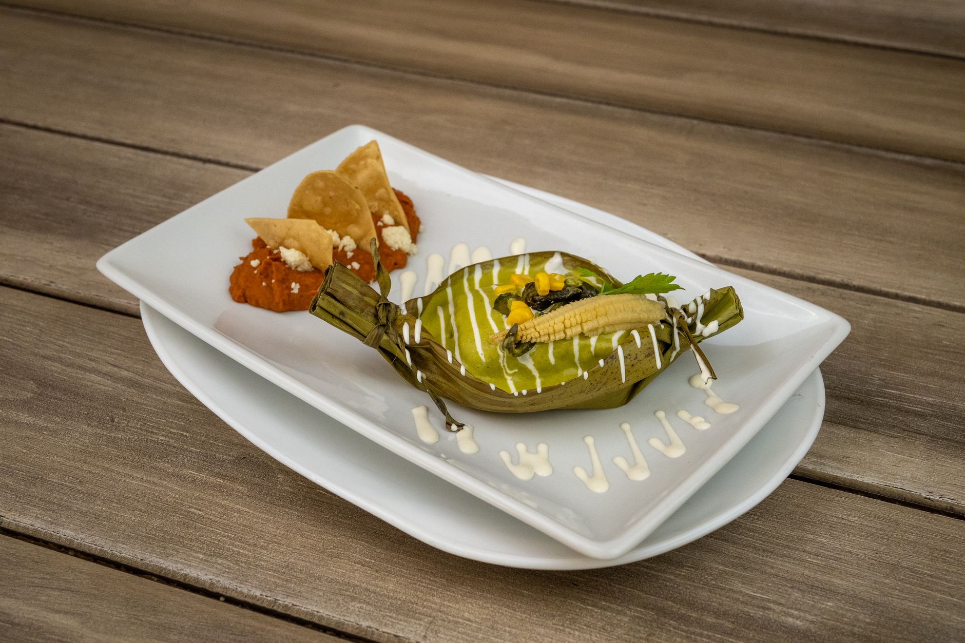 A delicious plated Mexican tamale served at a restaurant
