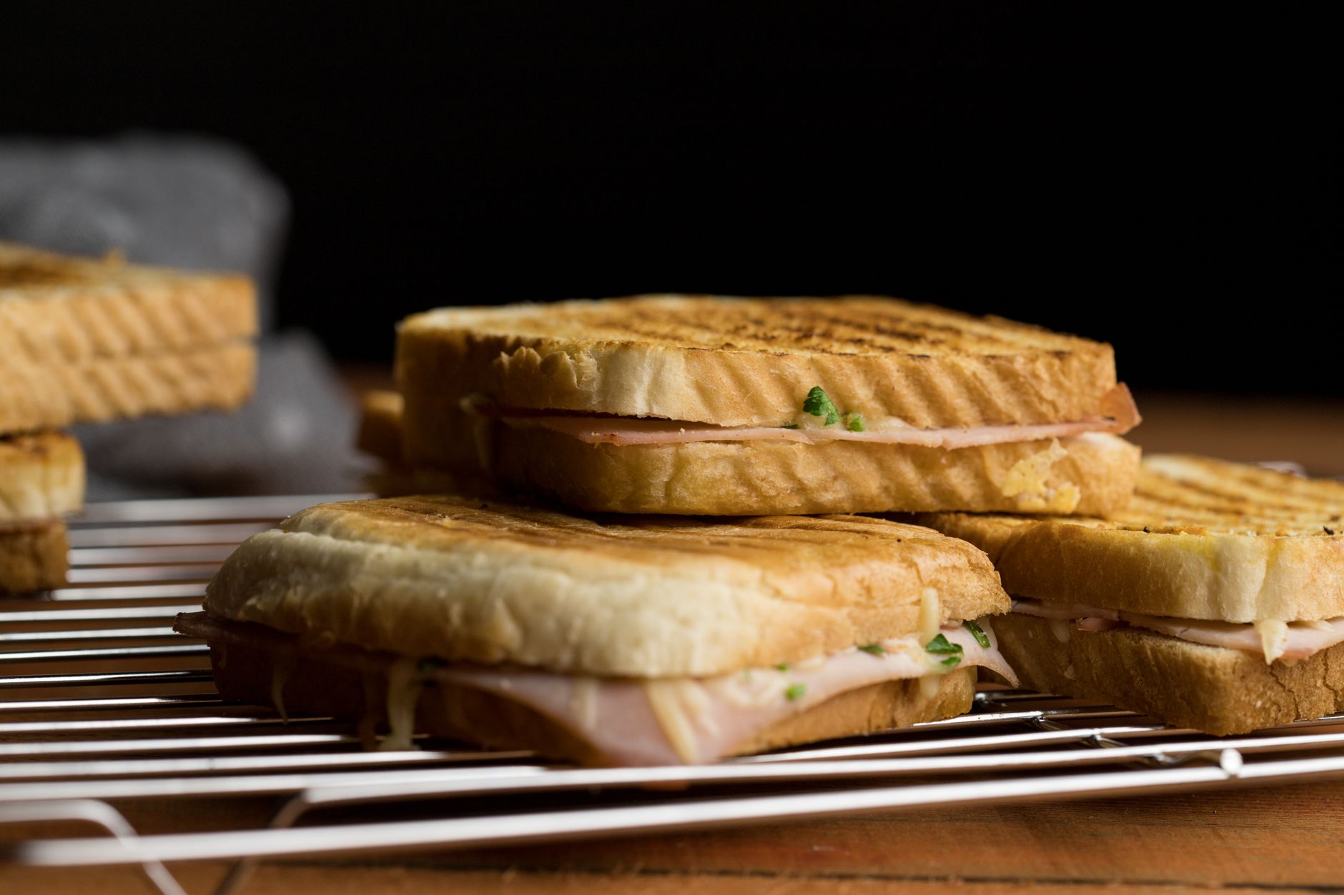 A close-up shot of freshly made sandwiches on a plate