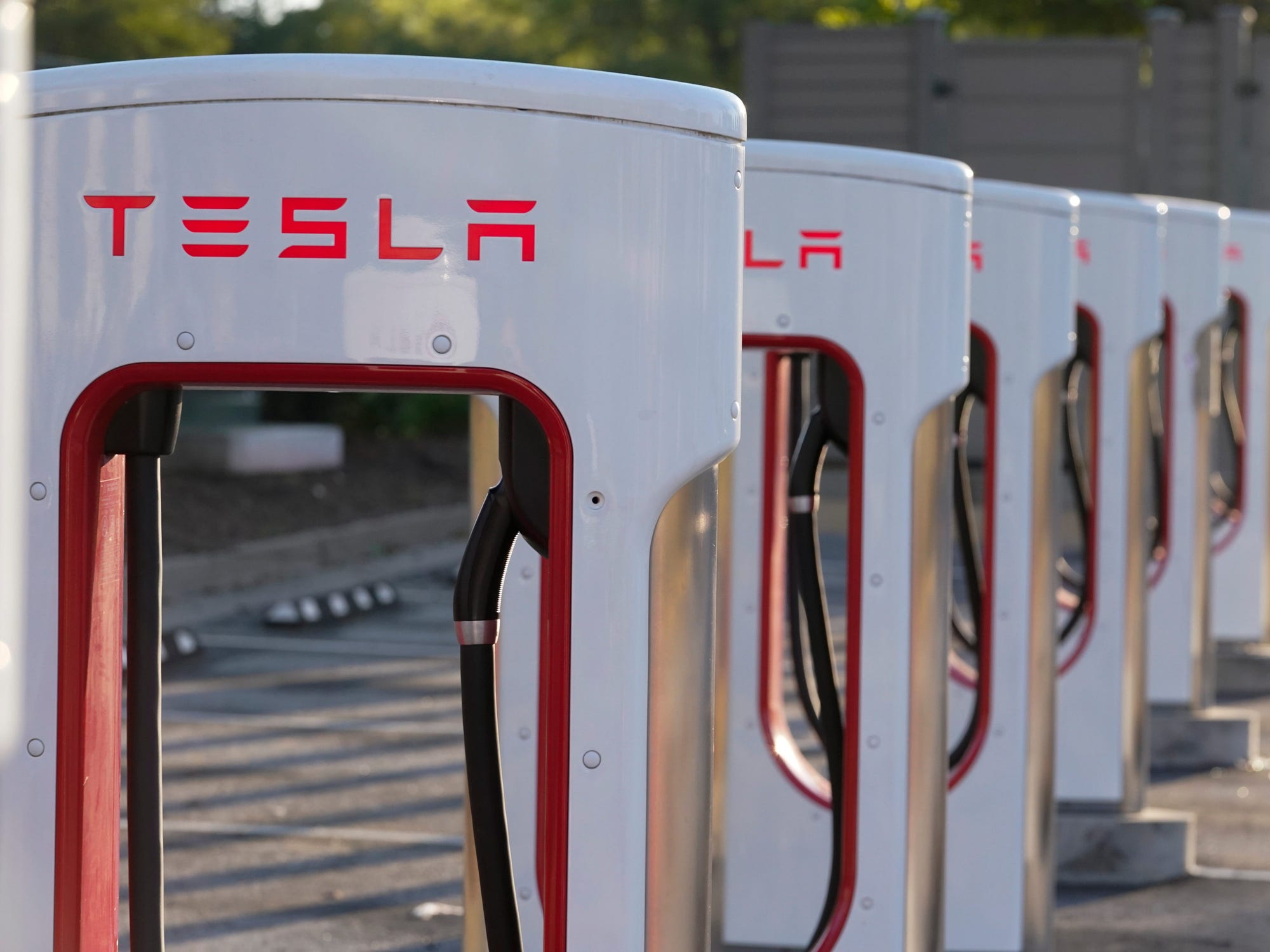 Row of Tesla Supercharger stations at Poncha Market