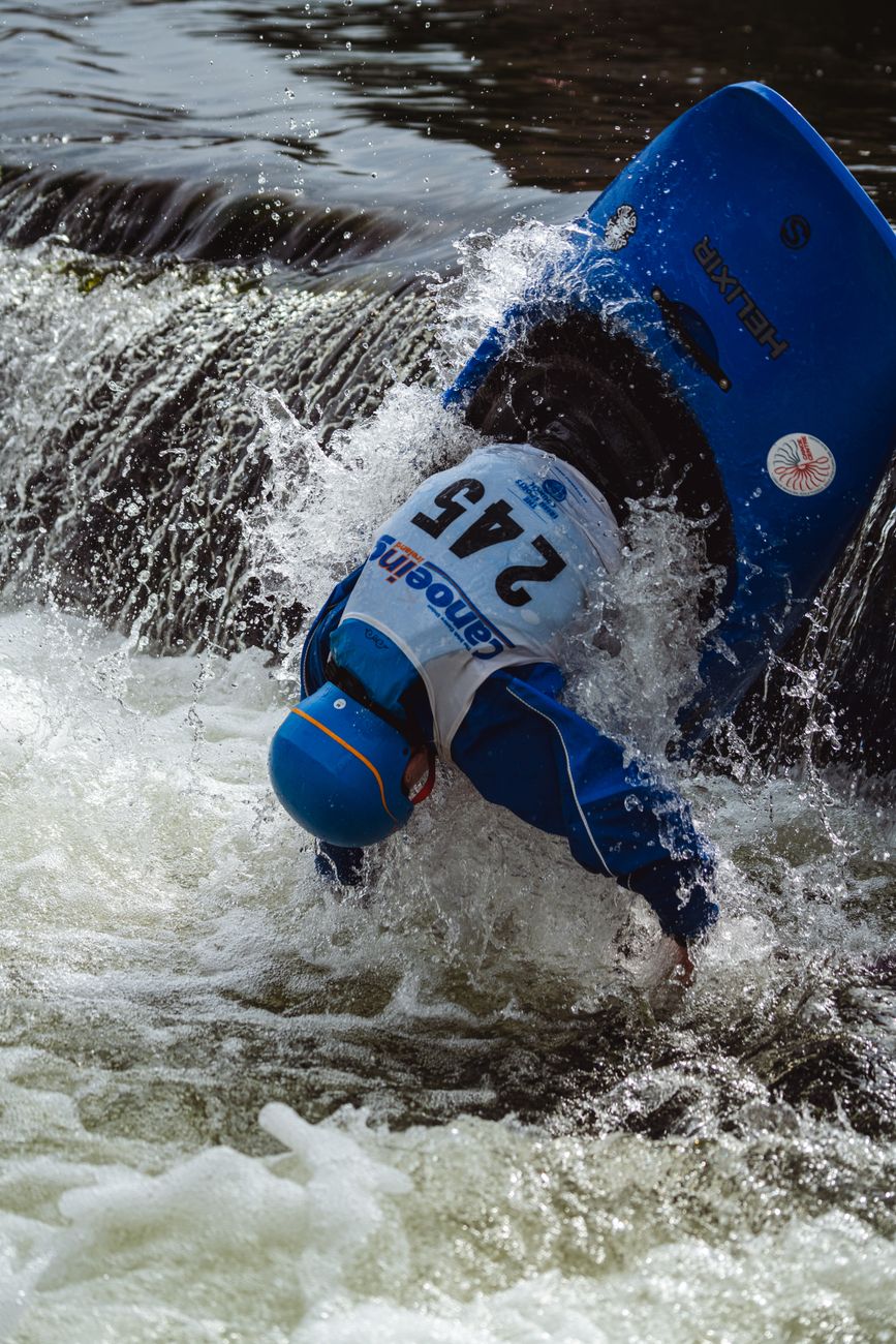 The thrill of kayaking captured in an intense whitewater rapids scene